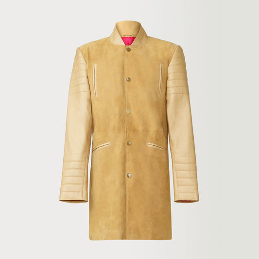 A Beautiful Suede Trench Coat, created by designer brand PRSVR. The PRSVR Lab Coat has a suede Body, and lambskin leather sleeves that show off a padded ribbed design on the shoulder and wrist of the sleeve. 