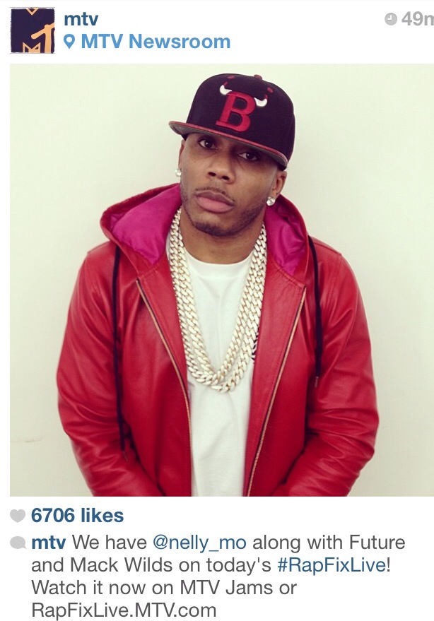 Nelly in Red Leather Hoodie