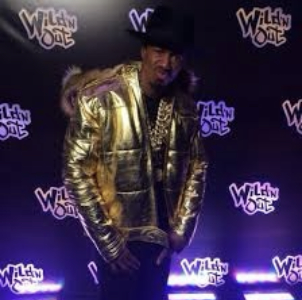 Nick Cannon in Gold Winter Coat