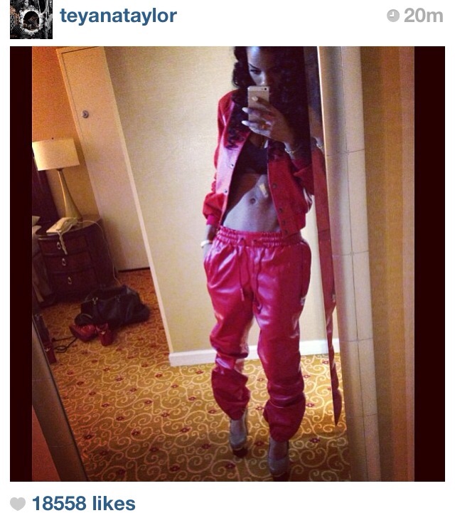 Teyana Taylor in Red Leatherman and Track Pants